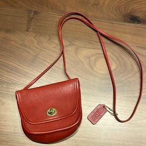 Coach red, cross-body pocketbook